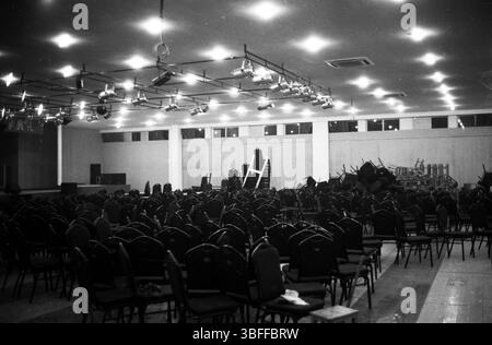 Early 2010s China Empty Event Hall with Disarranged Chairs After Conference Stock Photo