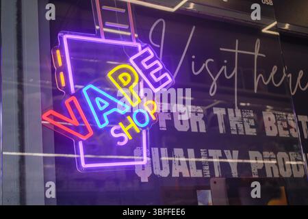 London, UK. 1  June 2025.  A vape shop neon sign  in Wimbledon town centre offering a clearance sale  as the UK government ban for single-use disposable vapes come into force  on 1 June. Credit Amer Ghazzal/Alamy Live News Stock Photo