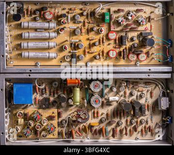Detailed View of Old Electronic Circuitry: Ideal for Tech-Themed Backgrounds Stock Photo