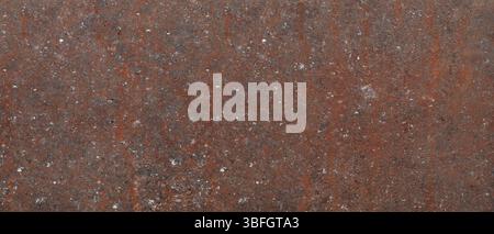 A brown surface with a lot of dirt and dust on it. The surface is rough and uneven abstract texture background for template pages and banners Stock Photo