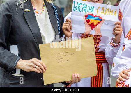 Ukrainian activists and allies protested for the release of Ukrainian children taken to Russia during the invasion of eastern Ukraine. A small group of children went to 10 Downing Street, asking Kier Starmer to raise the issue of the missing children. Stock Photo