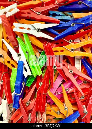 Multi-coloured clothes pegs Stock Photo