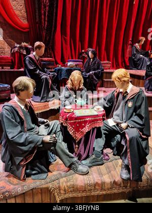 Group of Students Engaged in Themed Costume Study Session. London, UK Stock Photo