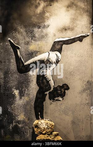 Banksy - Turnerin auf Truemmern, painting on a destroyed house wall in the Ukraine, exhibition The World of Banksy Stock Photo