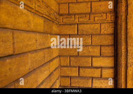 Ancient stonework in an ancient temple. Shell rock wall. Stock Photo