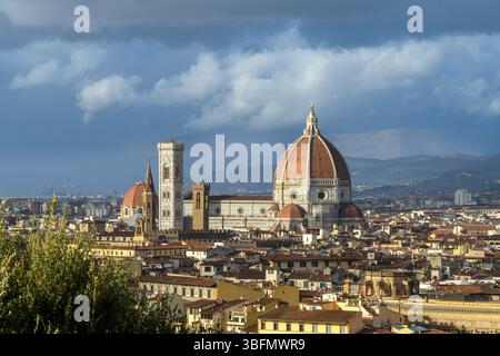 Panoramic view of Florence Cathedral with Brunelleschi's dome and Giotto's bell tower over the historic cityscape, Florence, Italy Stock Photo