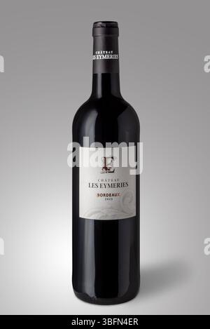 France - April 04, 2025: Chateau Les Eymeries Bordeaux Rouge red vintage 2023 wine bottle isolated on gray with clipping path included Stock Photo