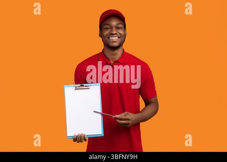 African american delivery man showing folder and pen Stock Photo