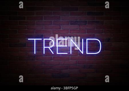 Neon sign with word Trend on brick wall Stock Photo