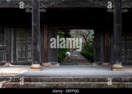The imposing Sanmon Gate along the approach to Tokoji Zen Buddhist temple of the Obaku sect in Hagi, Yamaguchi, Japan. Stock Photo