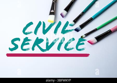 Civil Service Concept. Colorful Paintbrushes and Handwritten Text on White Background. Stock Photo