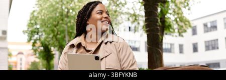 Engaged female university teacher interacts with students in a lively campus setting during spring. Stock Photo