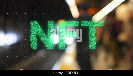 Image of green nft text over underground train arriving at metro station Stock Photo