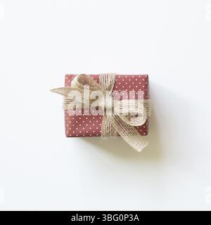 Dot pattern red gift box isolated on white background. top view, copy space Stock Photo