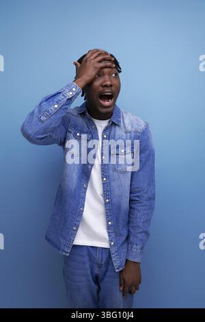 Charismatic stylish african man with black dreadlocks screwed Stock Photo