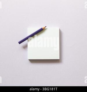 Memo paper, sticky notes with colored pencil on purple background. top view, copy space Stock Photo