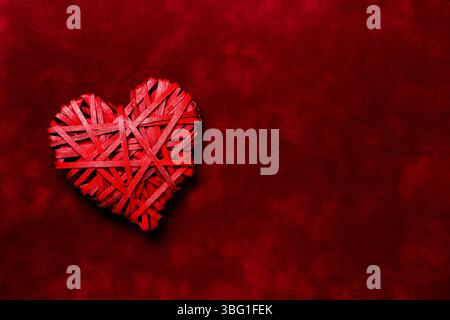red love heart on felt texture with copy space Stock Photo