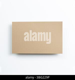 Blank brown memo pad on white background. top view, copy space Stock Photo