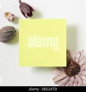 Reminder sticky notes with flower on white background Stock Photo