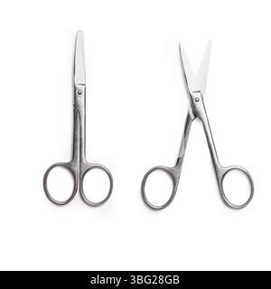 Stainless steel  scissors set isolated on white background. Open and close metal scissors. Stock Photo