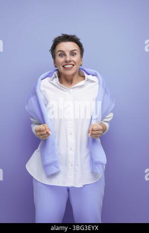 Portrait of energetic cheerful young millennial woman with short haircut smiling Stock Photo