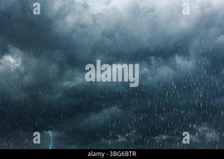 raining season. summer storm, dark sky cloudy heavy rain with thunder strike, weather in rainy season Stock Photo