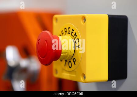 closeup emergency stop button of danger machine, stop and solving problem immediately concept Stock Photo