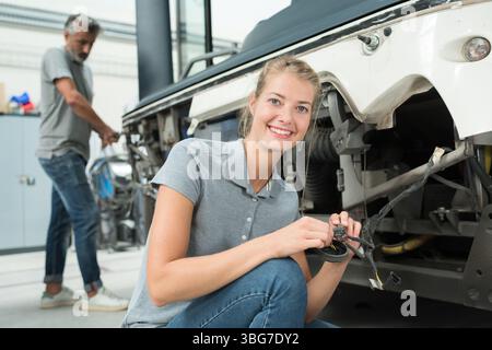 young female mechanic at work Stock Photo