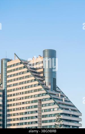 triking futuristic apartment blocks, Edificio Gulliver, define the modern skyline of Valencia, Spain. The unique triangular architecture and glass fac Stock Photo