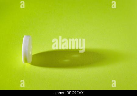 White button on yellow background , abstract minimal background Stock Photo