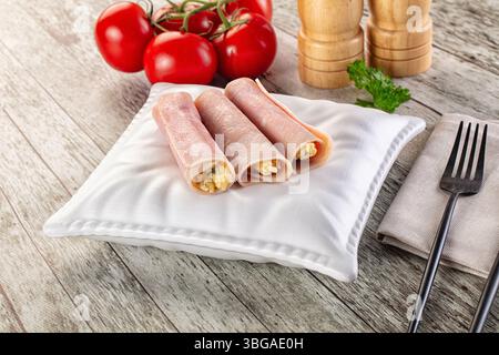 Tasty Roll with han and cheese snack Stock Photo - Alamy
