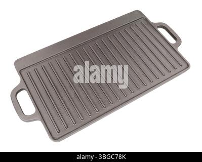 Cast iron metal griddle pan with handles incorporated isolated on a white background Stock Photo