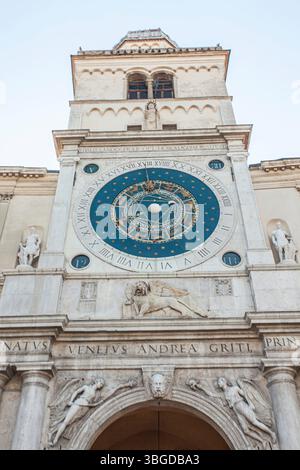 Padova, Italy 1 January 2025: Palazzo della ragione tower with astronomical clock, zodiac signs, lion of saint mark and statues, padua, italy Stock Photo