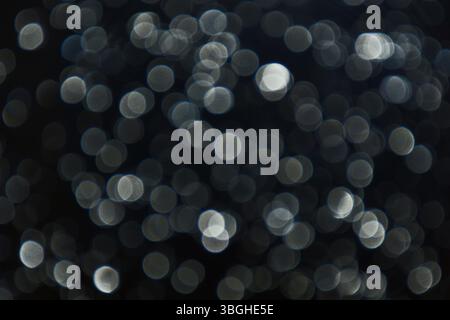 Light points, dark background, bokeh Stock Photo