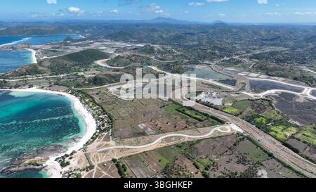 Aerial drone view of stunning Kuta Beach or Pantai Kuta in Kuta Mandalika, Lombok, Indonesia. Stock Photo