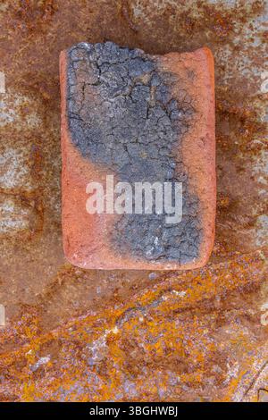 Stone on a rusty background, still life Stock Photo