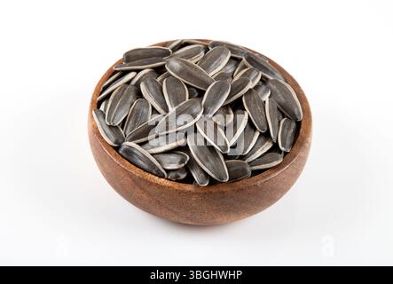 Sunflower seeds in a bowl on white background,top view Stock Photo