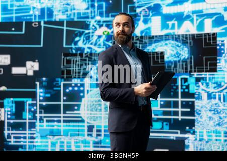 Young entrepreneur interacting with a digital AI brain symbolizing platforms, using deep learning and algorithm development for intelligent innovation and future tech strategy. Stock Photo