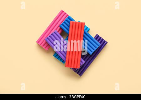 Colorful plasticine on beige background Stock Photo
