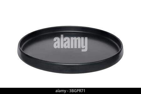 Empty round black ceramic matte dinner plate isolated cutout on white Stock Photo