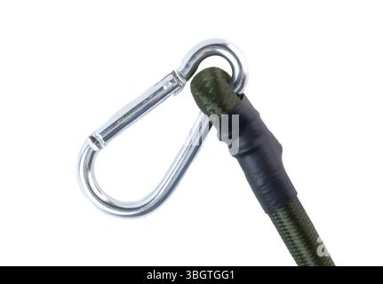 Close-up of a metal carabiner attached to a green elastic bungee cord on a white background. Durable tie down strap for automotive and outdoor use. Stock Photo
