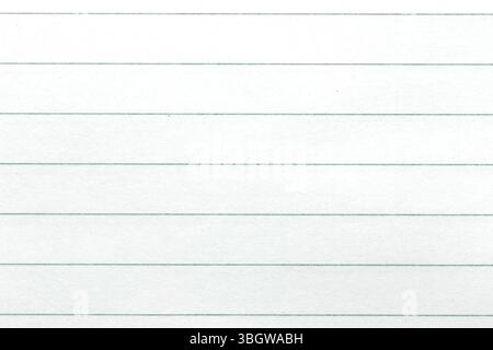 Clean and blank lined paper perfect for note taking or writing. Ideal for educational, office, or creative purposes. Stock Photo