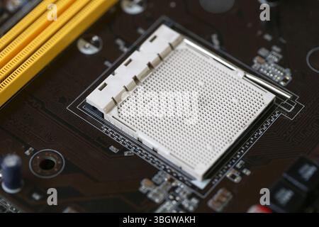 Focus on CPU slots to illustrate the architecture of computer technology, Background of computer equipment motherboard for design in your work concept Stock Photo