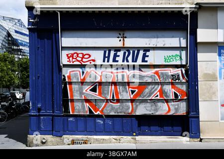 Street art on a shop front - Paris - France Stock Photo