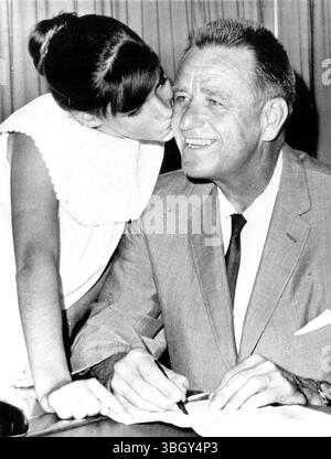 Elliott Roosevelt, the son of President Franklin D. Roosevelt, is ...