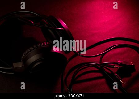 Black headphones on a dark background Stock Photo