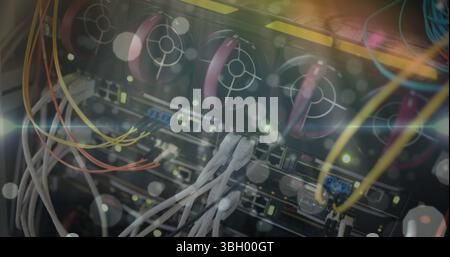 Image of dots and lights over computer wires Stock Photo