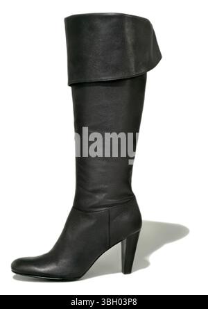 calvin klein black boot photographed on a white background Stock Photo
