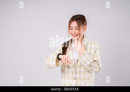 Woman Time Person Watch Clock Hurry Deadline Business Female Hour, A Young Businesswoman Checking the Time with a Confident Look, Balancing Busy Sched Stock Photo