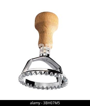 A close-up shot of a single ravioli cutter with a wooden handle and a metal isolated on a white background. Stock Photo